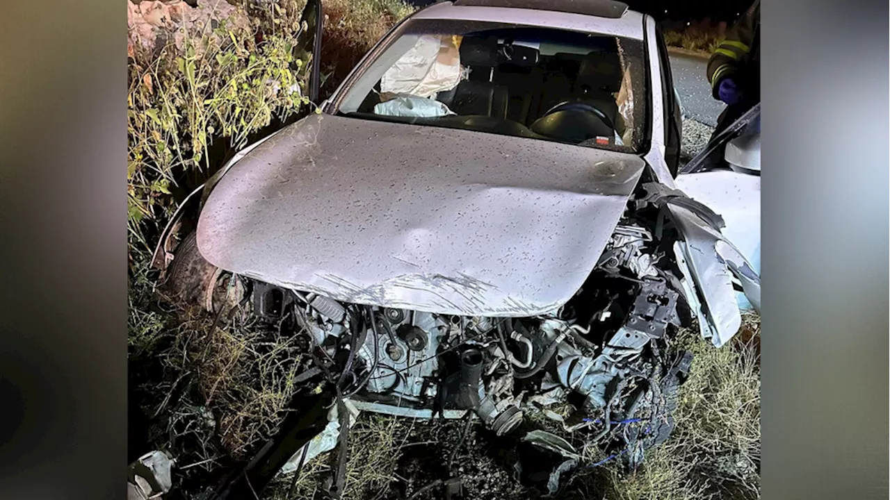 Vehicle slams into rock wall in Hurricane City, two transported