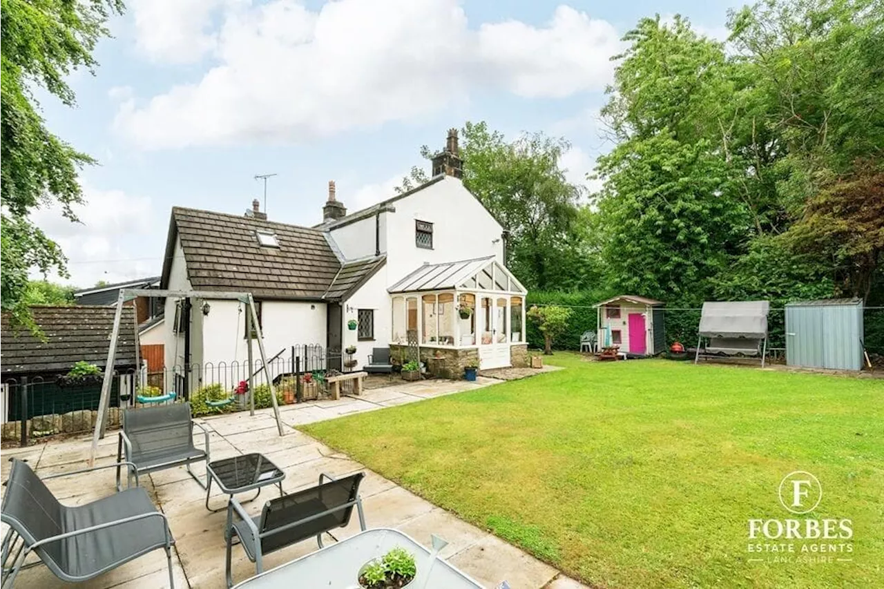 Historic 3 storey, 5 bed Whittle le Woods family home with characterful design, conservatory, and large garden up for sale