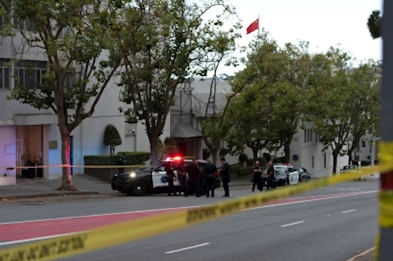 Driver who crashed into Chinese consulate carried knife, crossbow