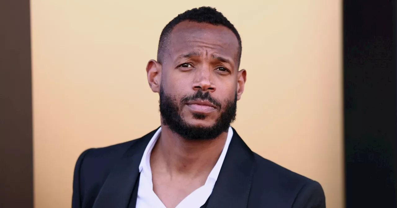 Marlon Wayans says he is being unfairly prosecuted after being racially targeted by gate agent