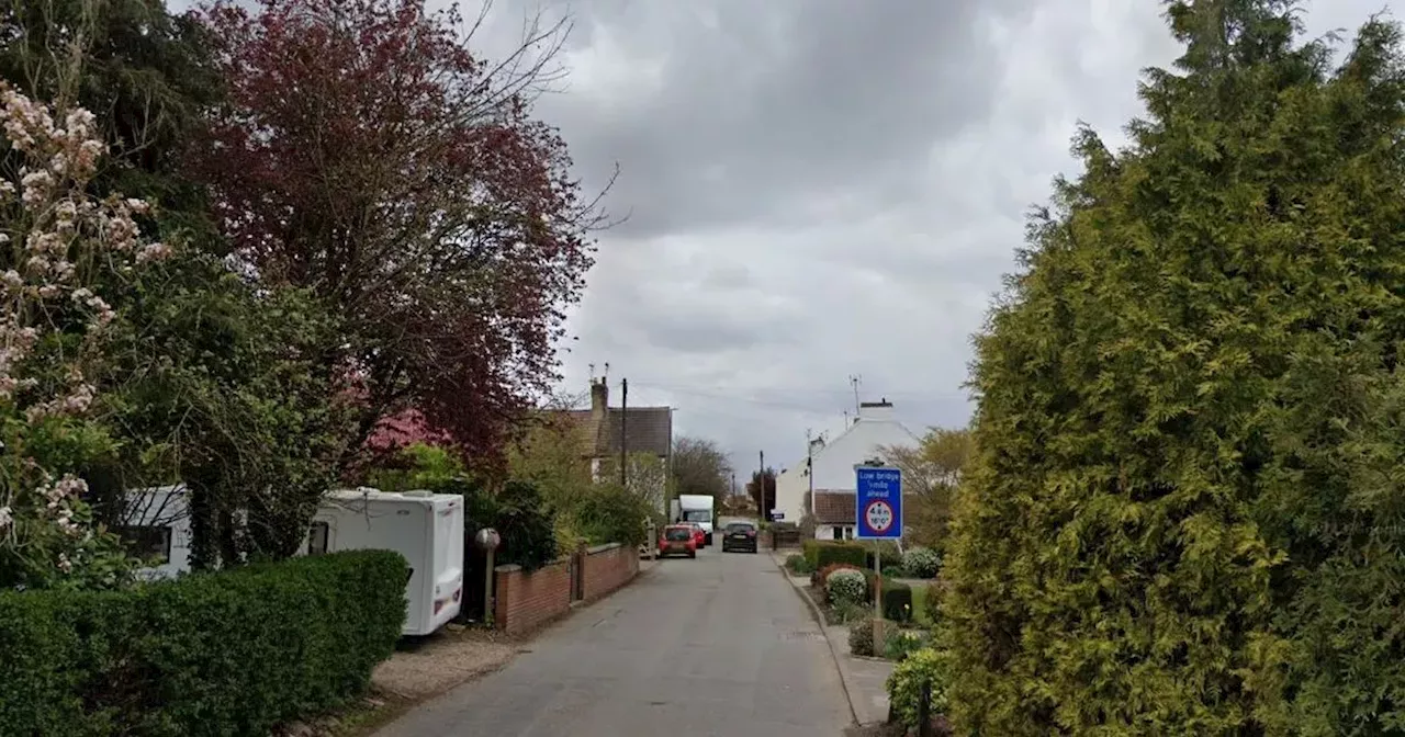 Homes evacuated and hall used as refuge as flood hits village