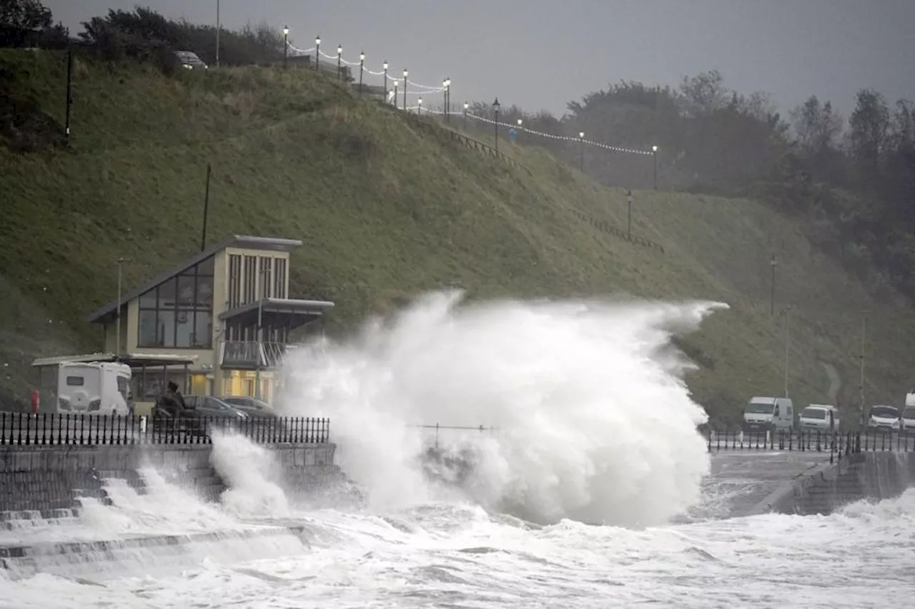 Rescue crews rush to save people from severe flooding as Storm Babet hits