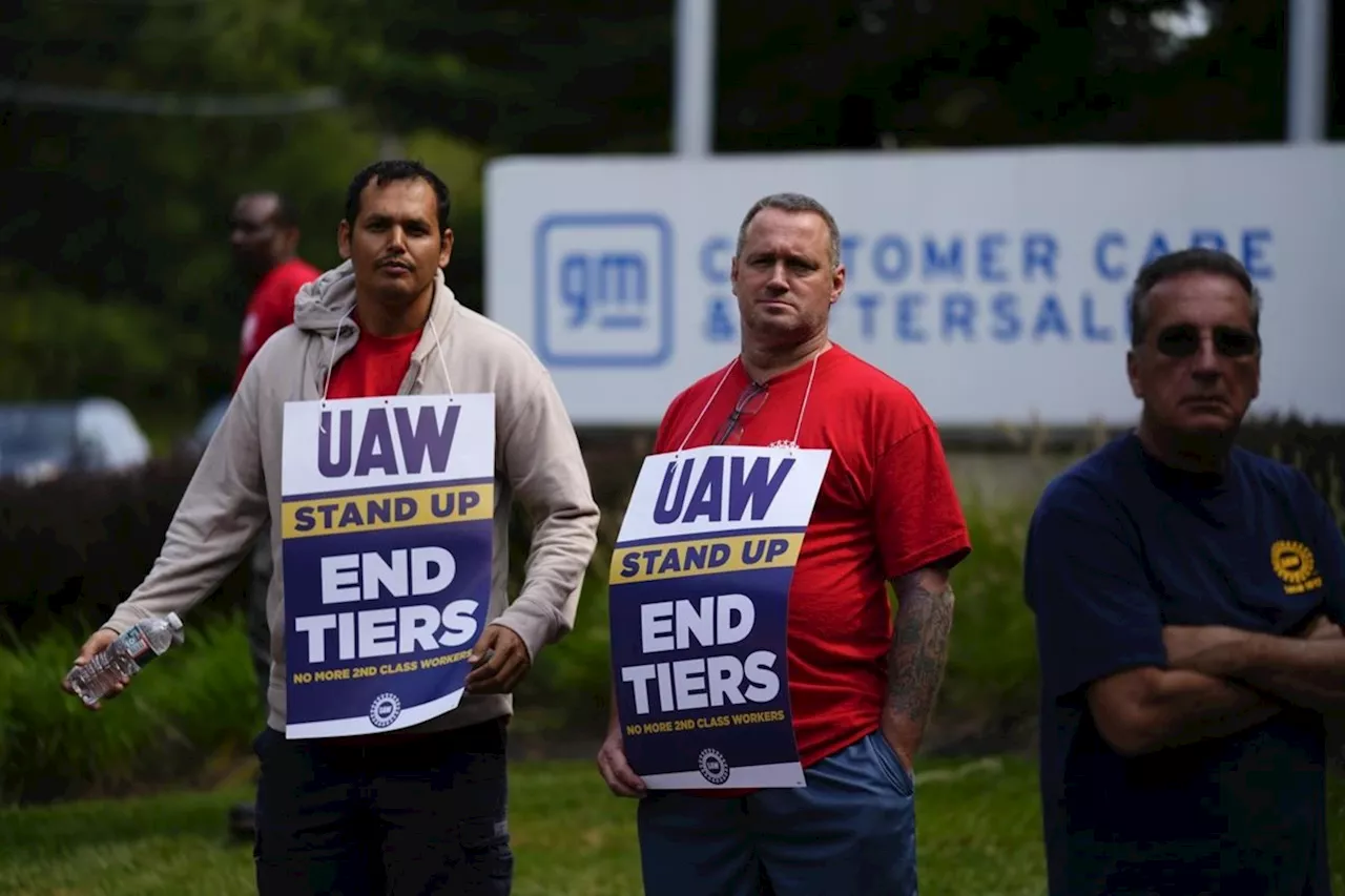 Head of auto workers union says strikes will continue in drive to gain better offers from companies