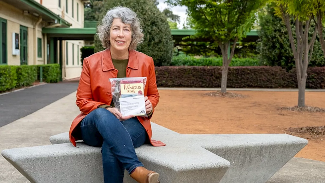 Author Maura Pierlot's Book Bench Project a random act of kindness bringing joy to readers passing by