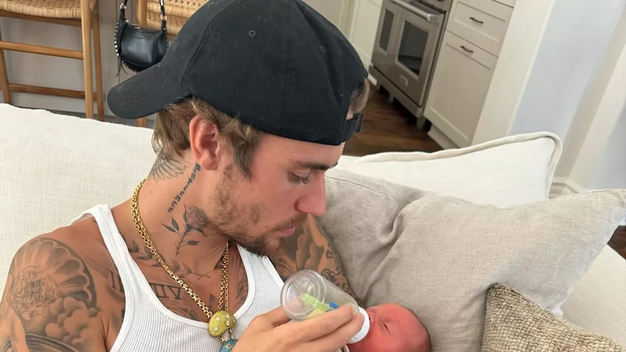 Justin and Hailey Bieber look ultra-broody as Justin kisses tiny baby