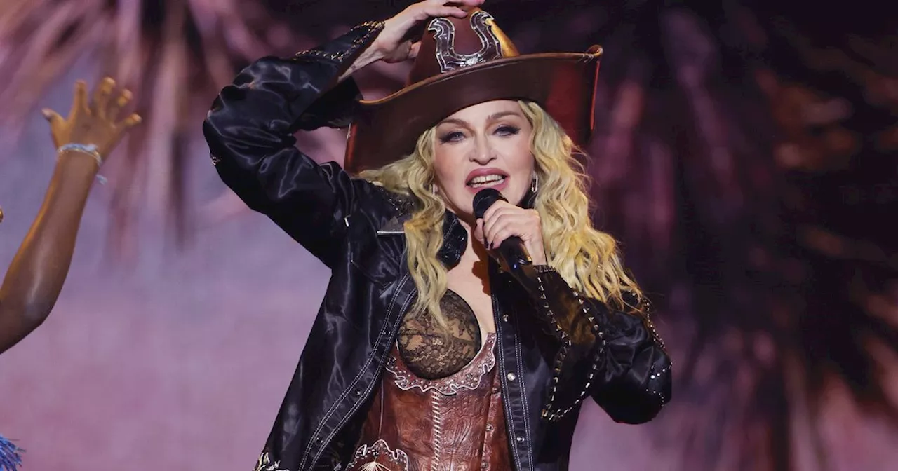 Madonna pays tribute to family as she's joined on stage by five of her six kids