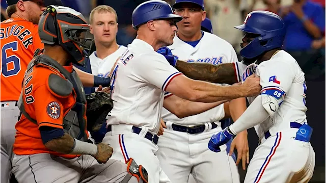 Rangers slugger Adolis García, leading the AL in RBIs, exits game after  getting hit by a pitch