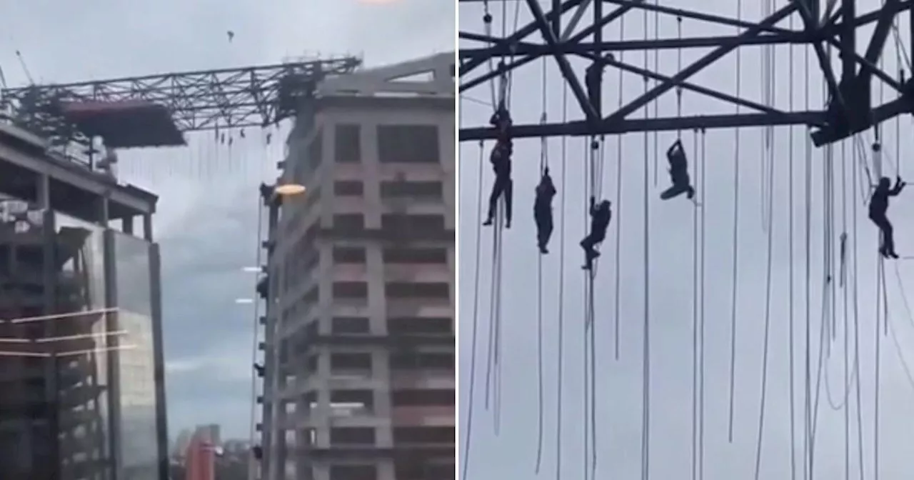 Brazil: Person killed after workers left dangling off building