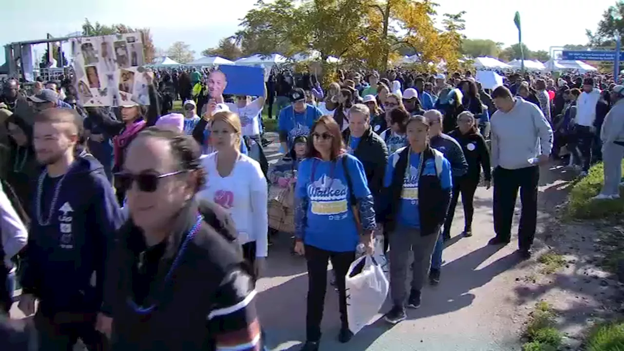 Thousands march in ‘Out of the Darkness' walk in support of mental health awareness in Uptown