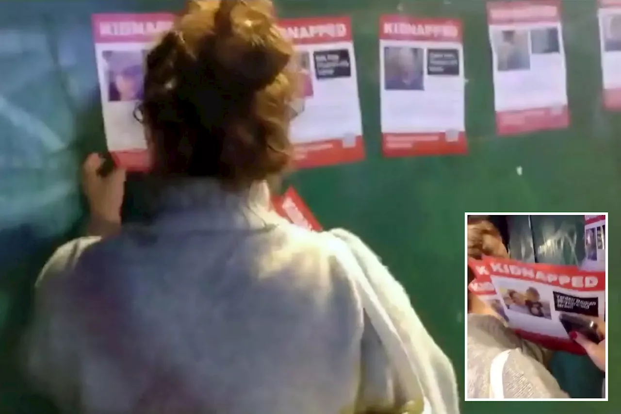 Woman caught on camera ripping down NYC posters of Israeli hostages: 'Are you proud of yourself?'