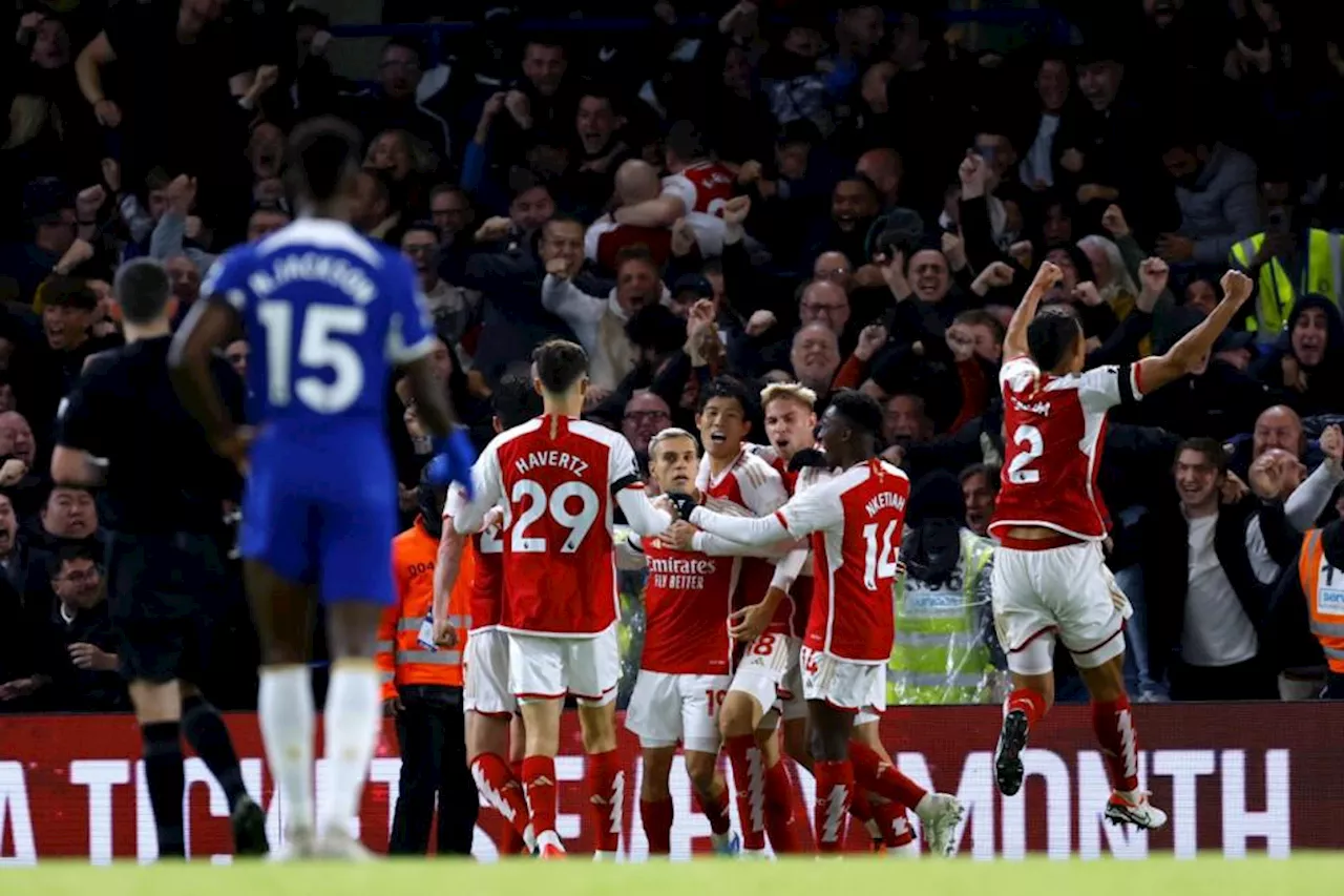 Arsenal come from two goals down to snatch a point at Chelsea