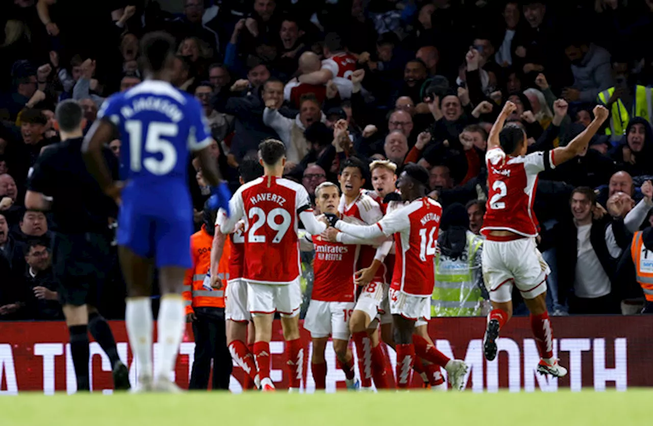 Arsenal come from two goals down to snatch a point at Chelsea