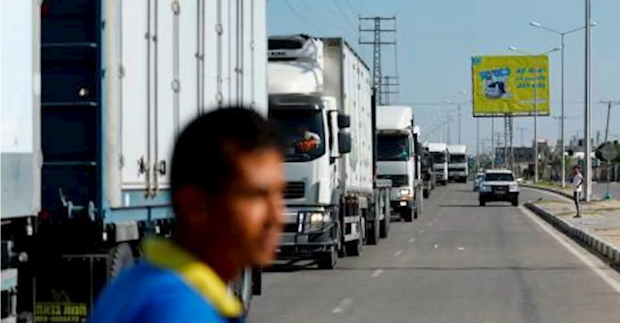 Humanitarian aid starts entering Gaza crossing from Egypt