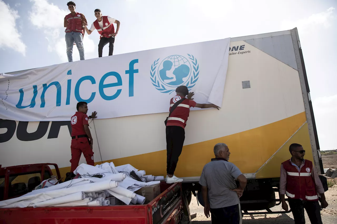 First aid trucks enter Gaza from Egypt; Israel says it will increase attacks on Gaza