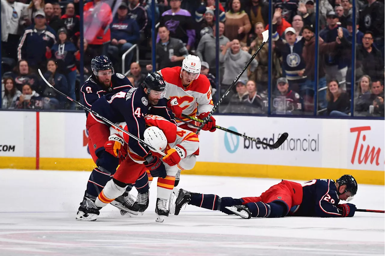 Flames’ Rasmus Andersson suspended four games for charging Blue Jackets’ Patrik Laine