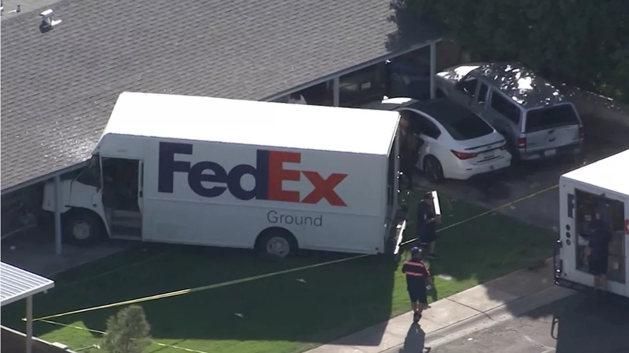 Delivery truck crashes into Tempe house