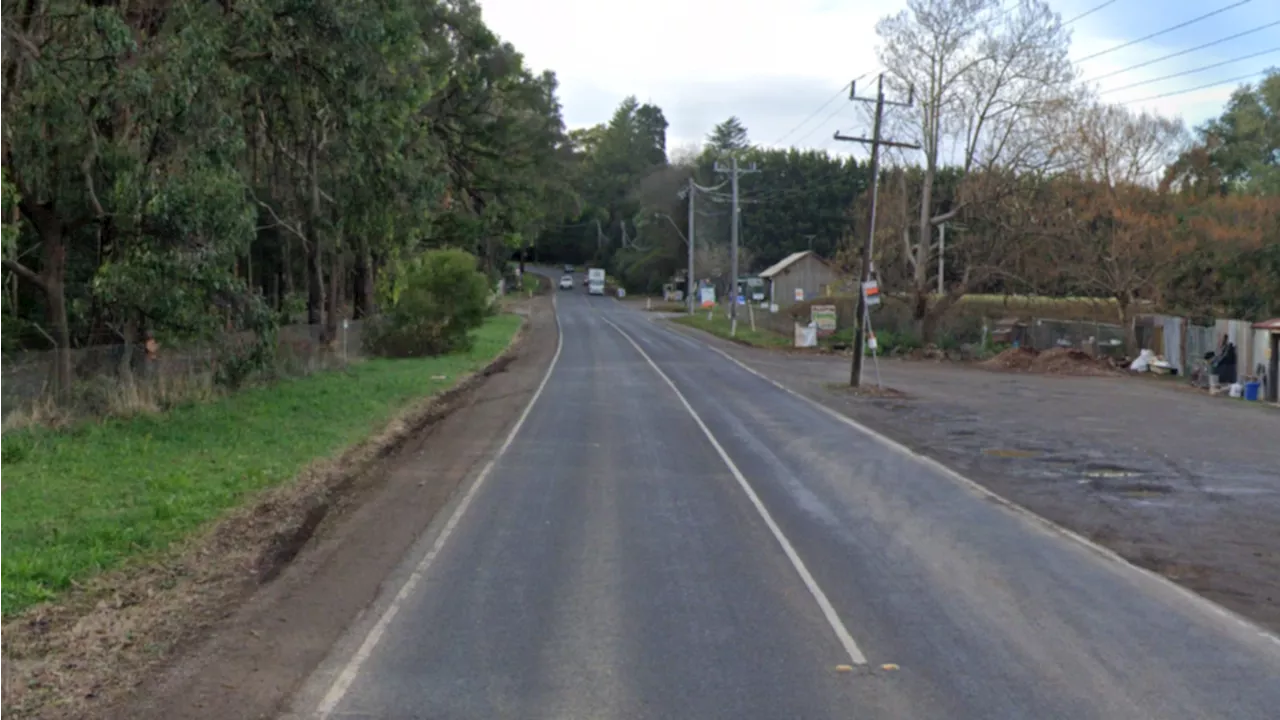 Woman killed when car crashes into police in Silvan, Victoria