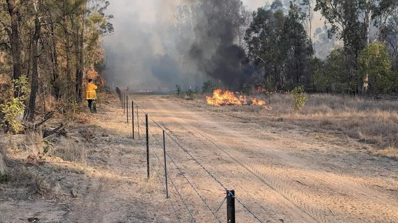 Firefighters fear homes may have been lost as 'severe' bushfires spread west of Toowoomba