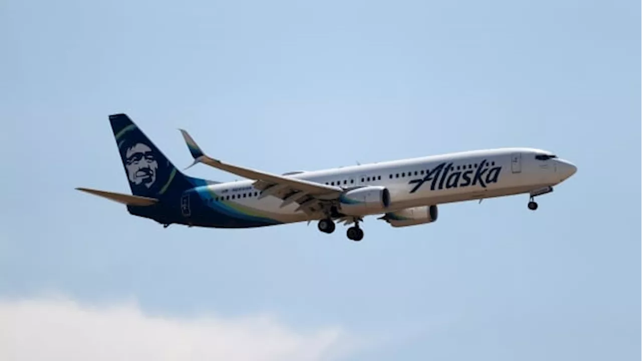 Off-duty pilot in cockpit accused of trying to stop engines of Alaska Airlines flight