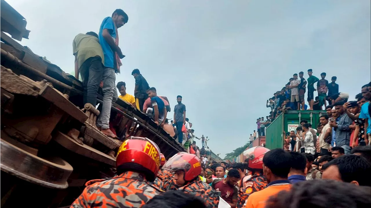 At least 15 killed and many injured when one train hits another in central Bangladesh