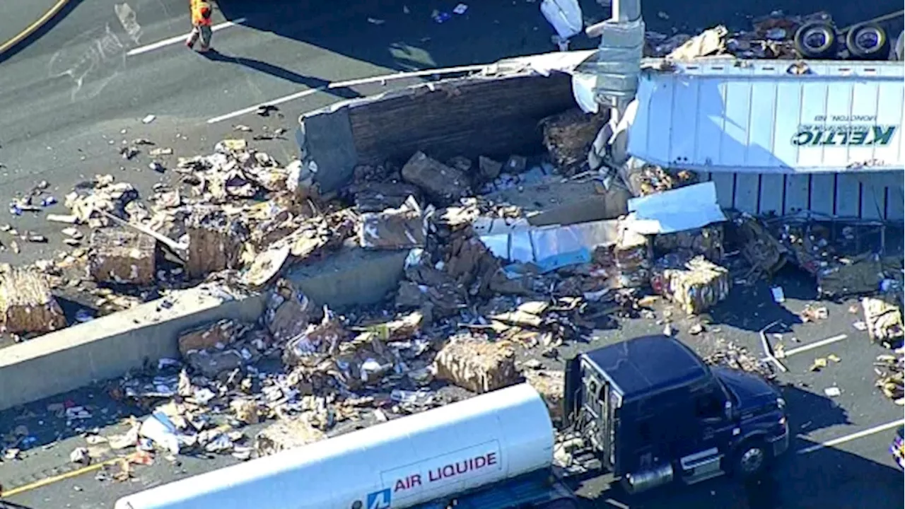 Most of Highway 401 closed near Ajax after collision scatters cargo all over the road