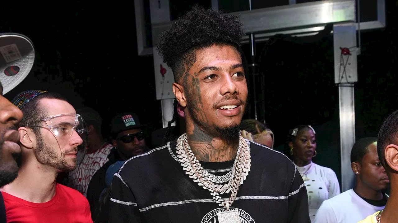 Rapper Blueface turns private suite at Rams game into personal strip club, then proposes to girlfriend