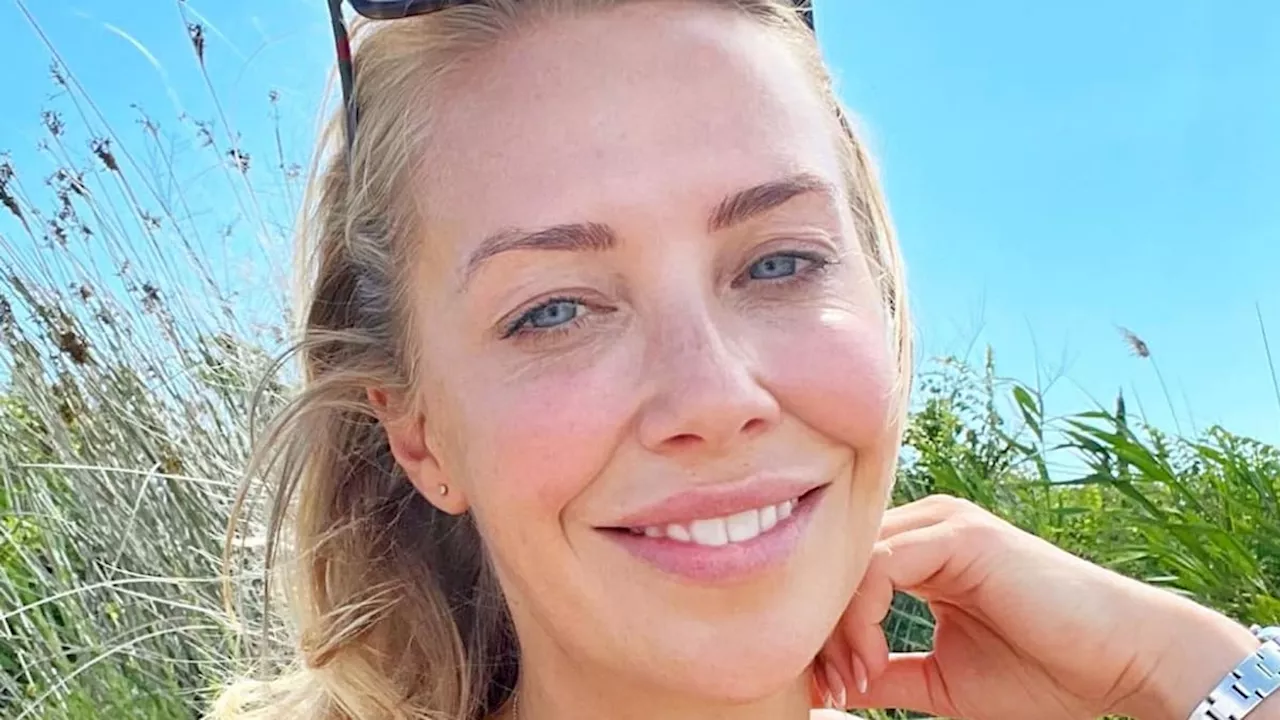 Laura Hamilton wows in daring bikini as she soaks up the sun alongside lookalike children