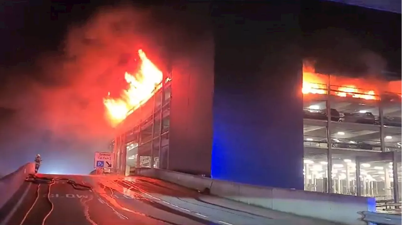 Man arrested over Luton Airport car park fire which destroyed up to 1,500 cars