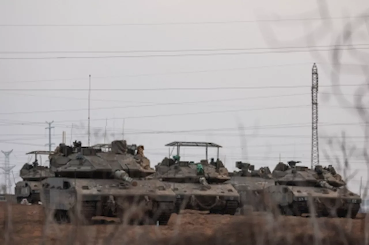 Israel mounts limited Gaza ground raids, puts hostage number at 222