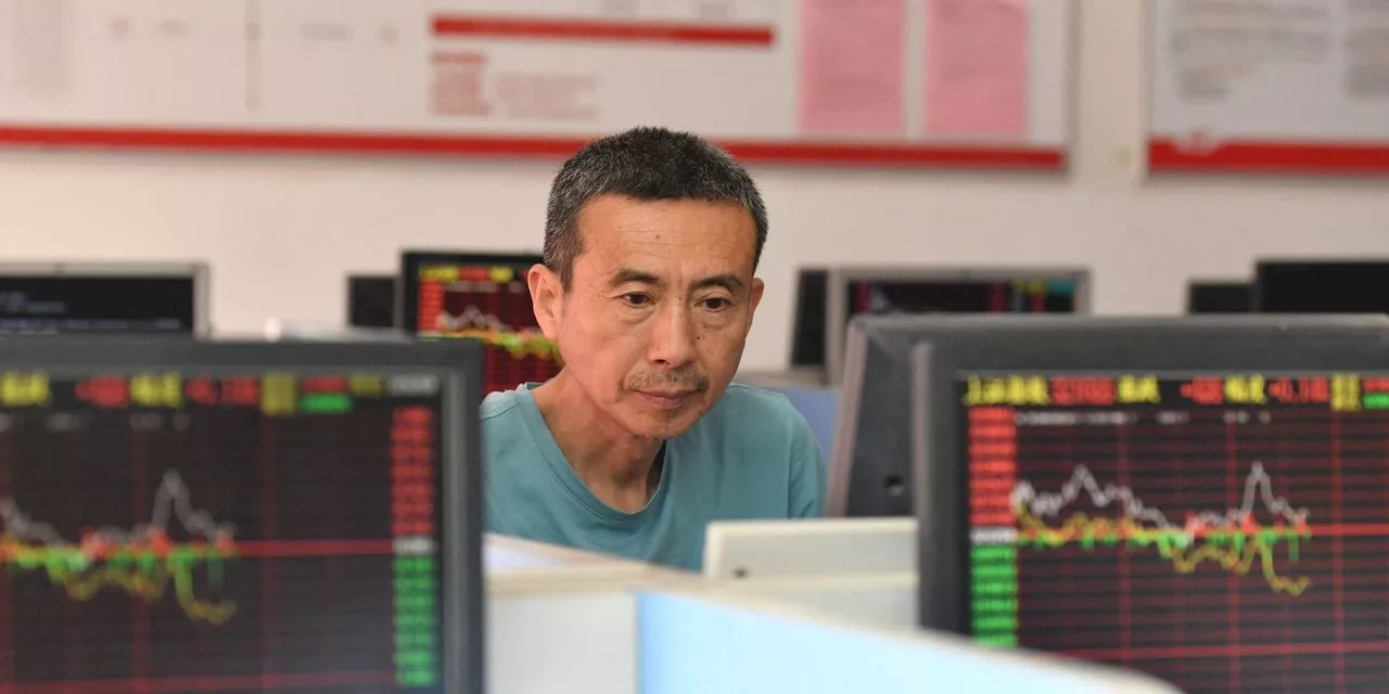 Chinese stocks erase 4 1/2 years of gains as foreign investors flee at record pace