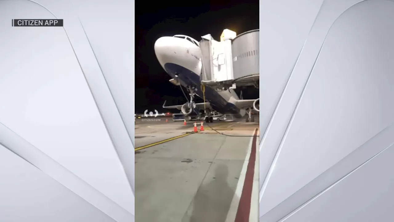 JetBlue plane tilts back after landing at JFK Airport; no injuries are reported