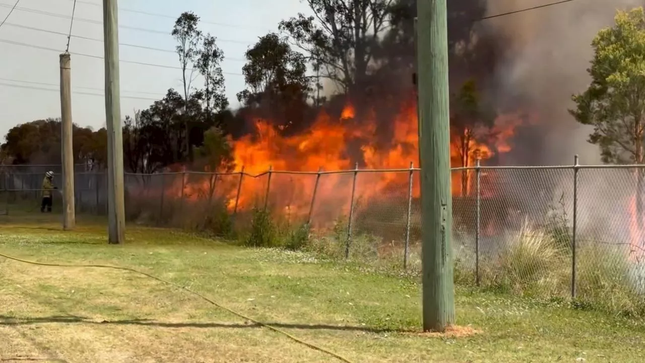 Huge fire erupts near rugby field