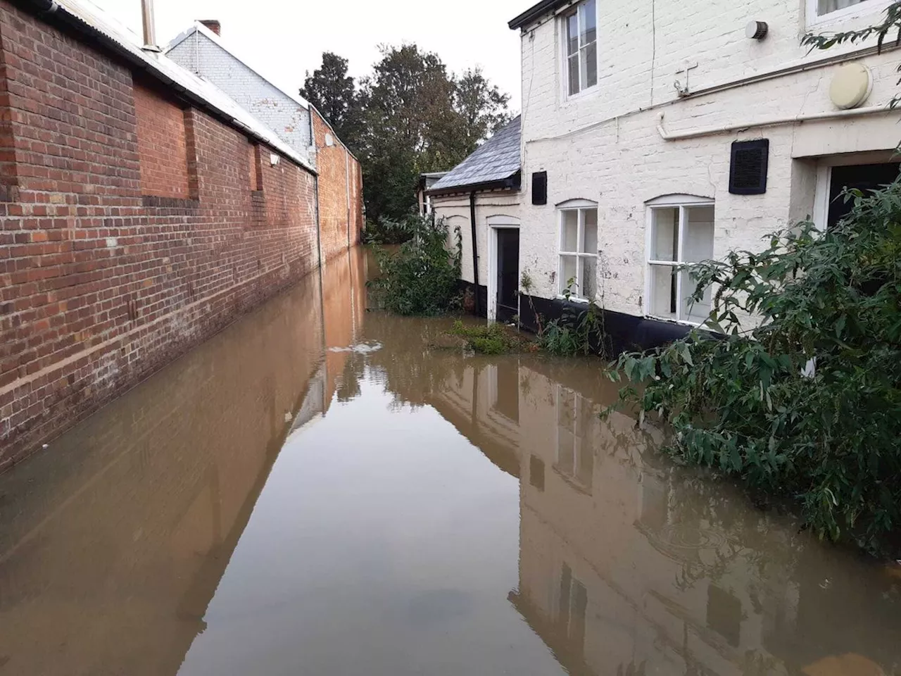 Photos show flood water remaining in Shrewsbury and Bridgnorth with warnings still in place