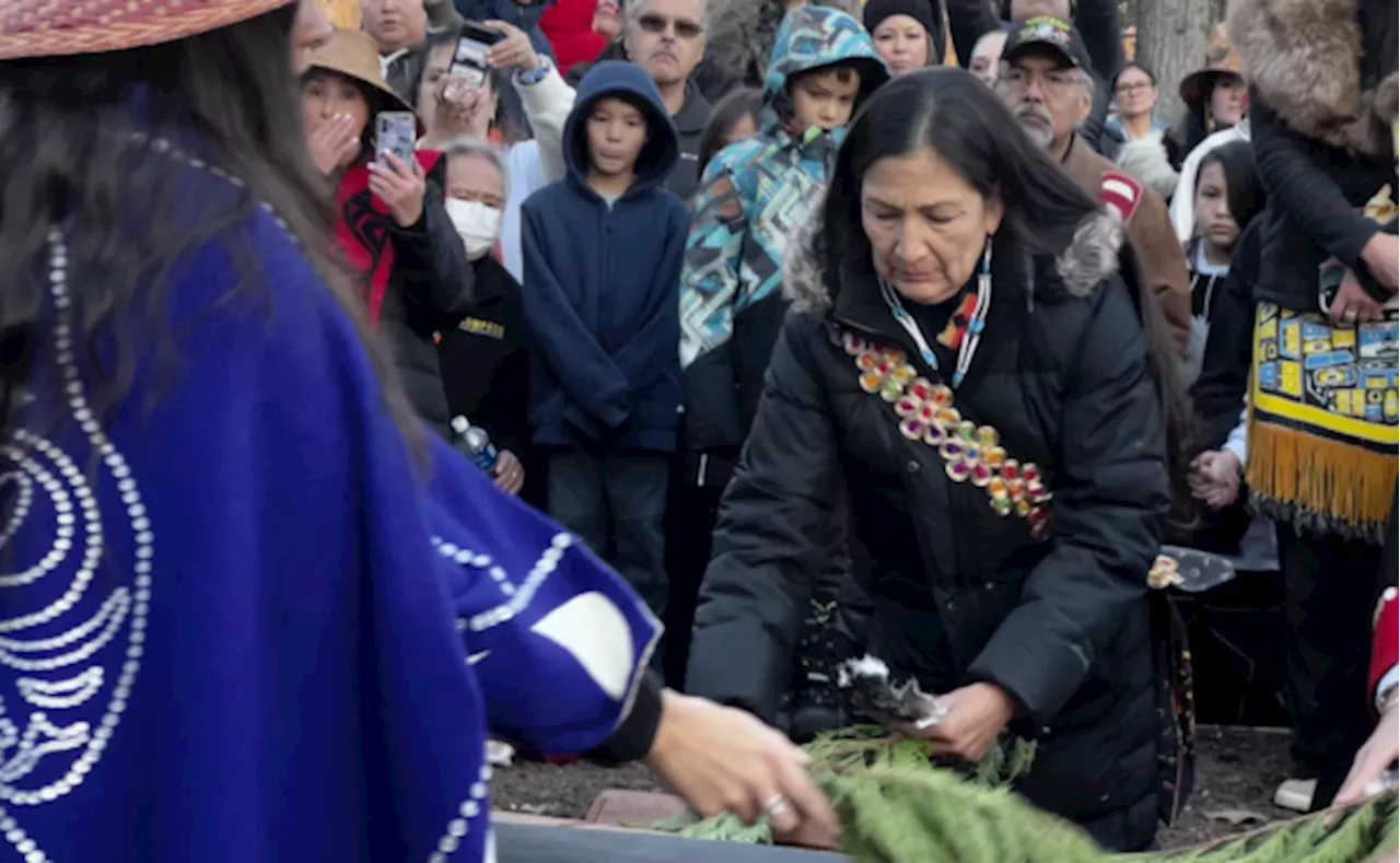 Haaland leads historic day of healing at totem raising for Alaska boarding school survivors