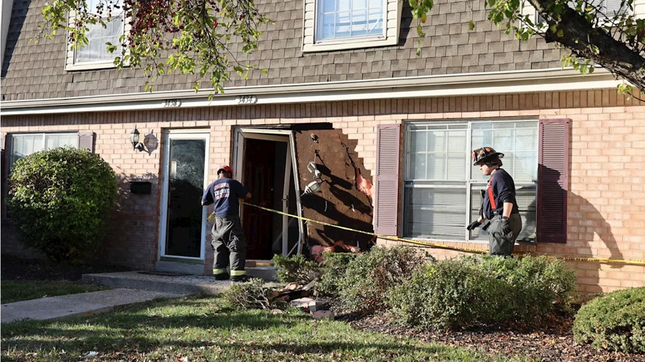 IFD: No injuries after car crashes into apartment building on Indy's near northwest side