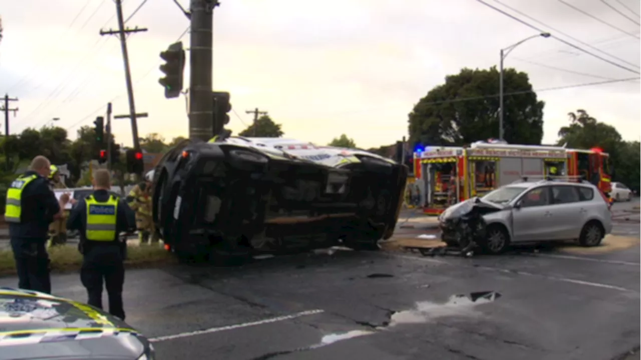 Paramedics injured in ambulance and car crash in Preston, Melbourne