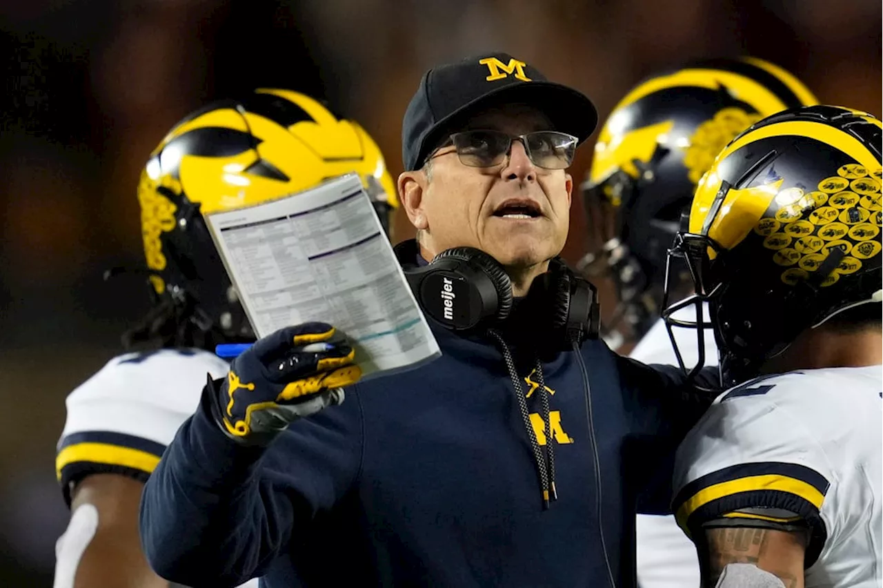 AP Source: Tickets purchased in the name of suspended Michigan staffer to two SEC title games