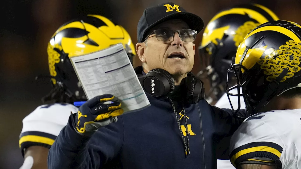 Tickets purchased in the name of suspended Michigan staffer to two SEC title games, AP source says