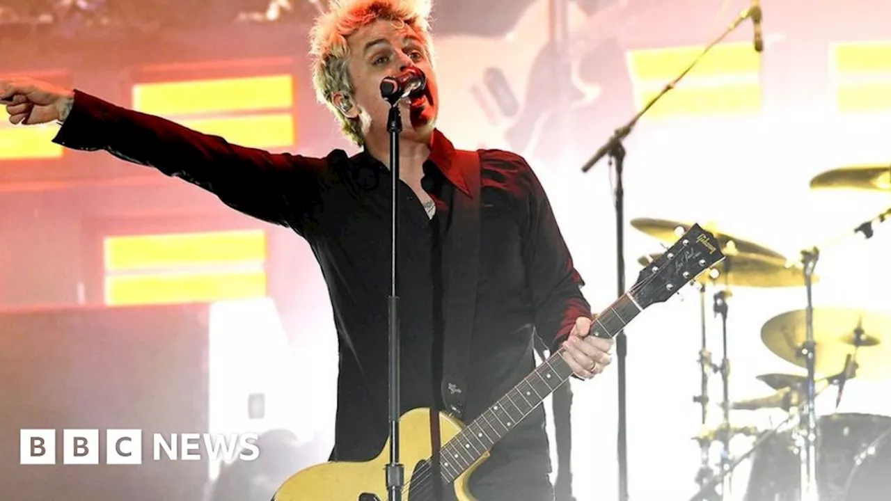 Green Day: Saviors front cover puts Belfast riot front and centre