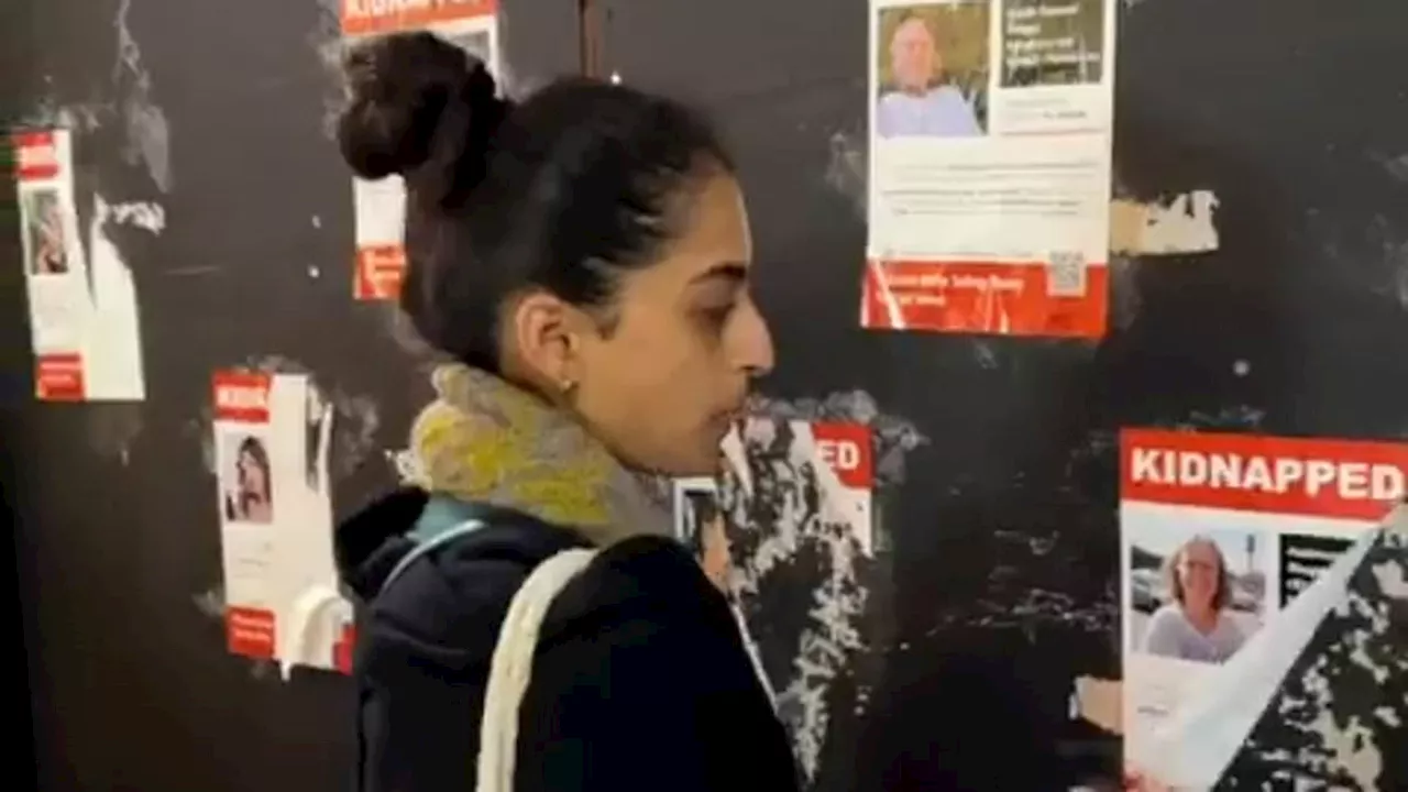 Palestine supporters tear down more posters of Israeli women and children kidnapped by Hamas...