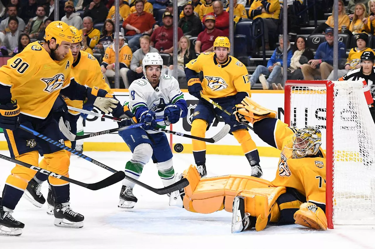 Canucks edge Predators thanks to second-period spurt