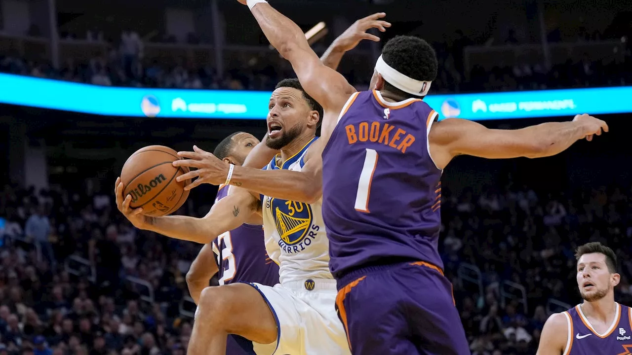 Booker, Durant lead Suns past Curry and Warriors 108-104 in season opener