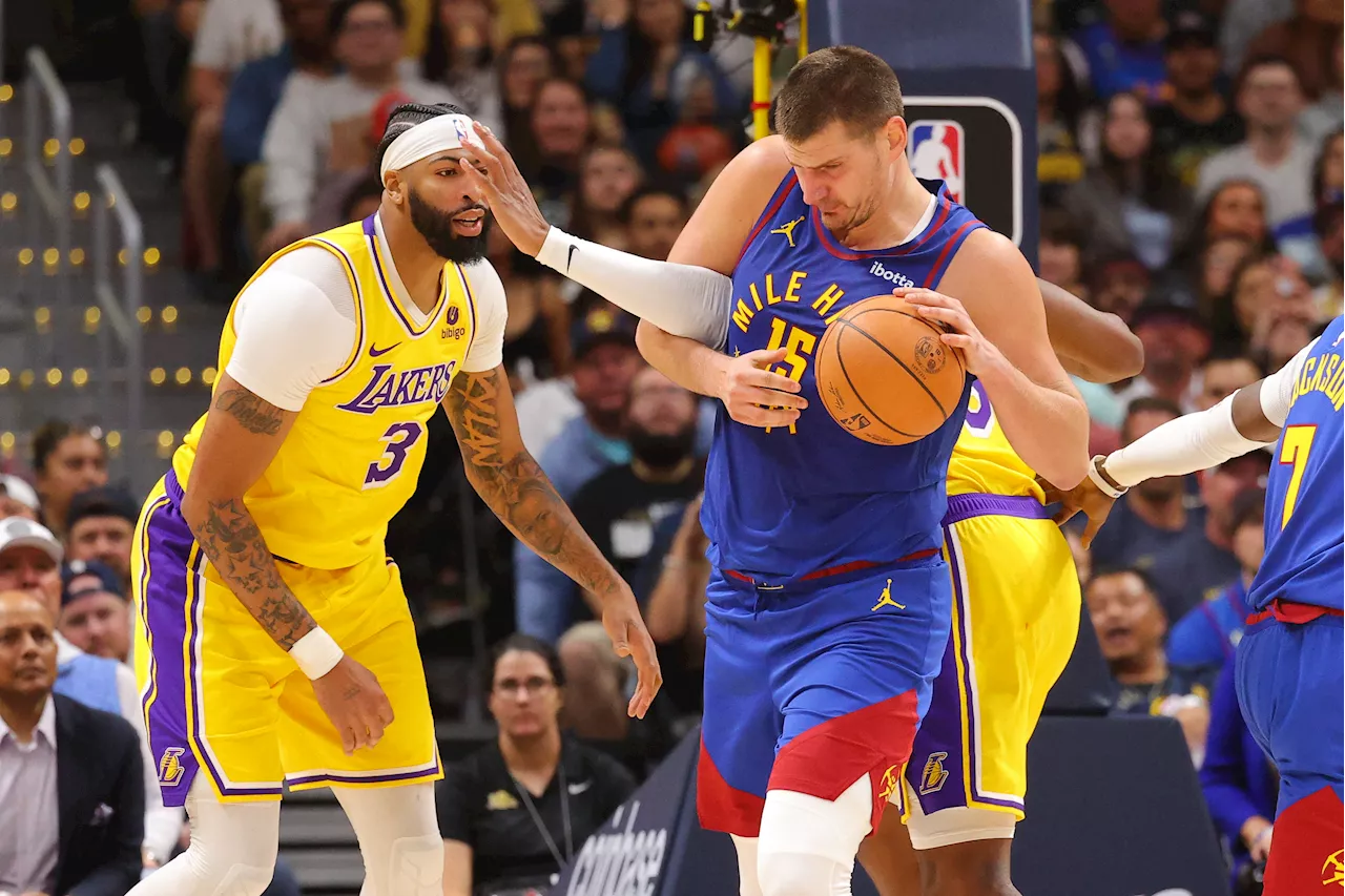 Jokic dominant as Nuggets down Lakers in season opener