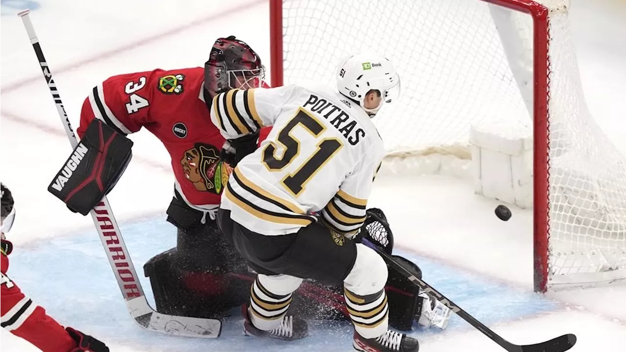 Poitras, Frederic help undefeated Bruins blank Blackhawks