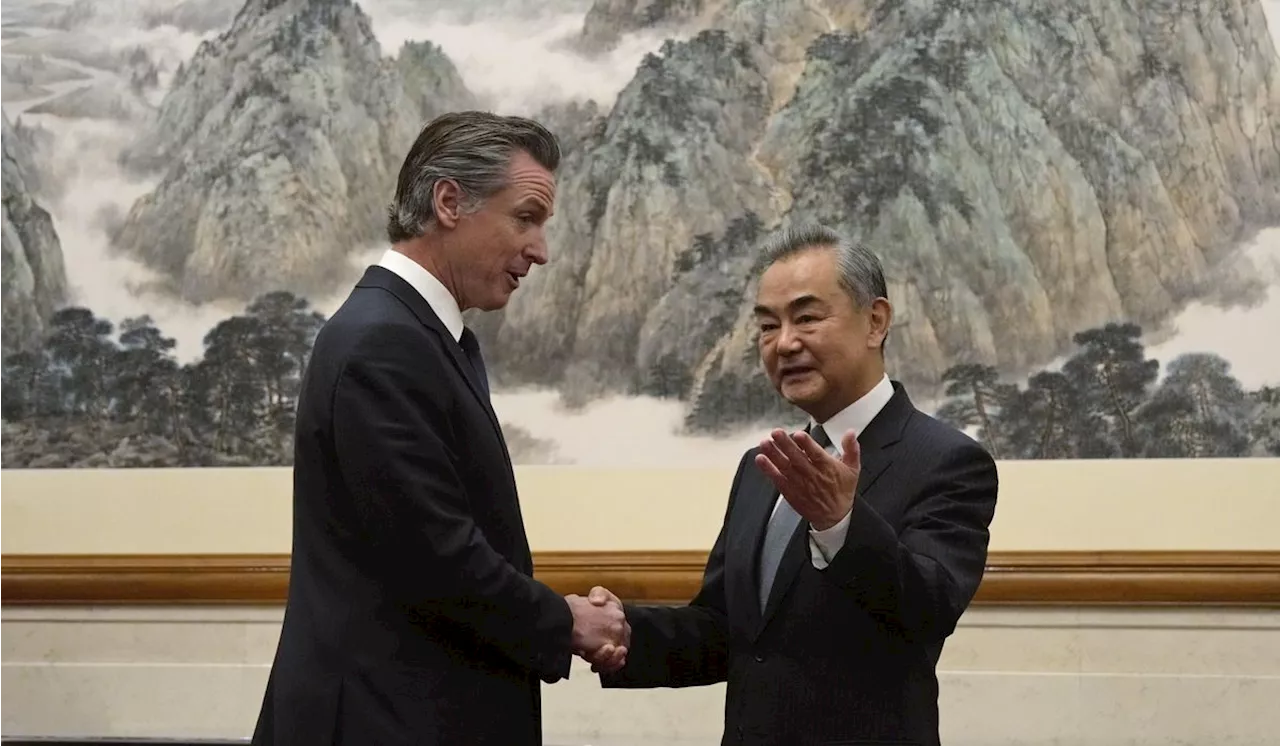 Gavin Newsom has rare friendly exchange with China's senior diplomat Wang Yi