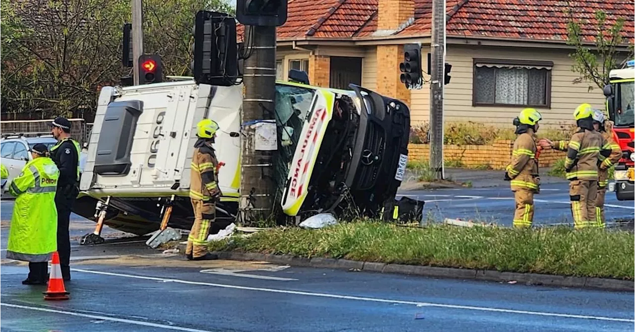 Three people hospitalised after ambulance rollover in Victoria