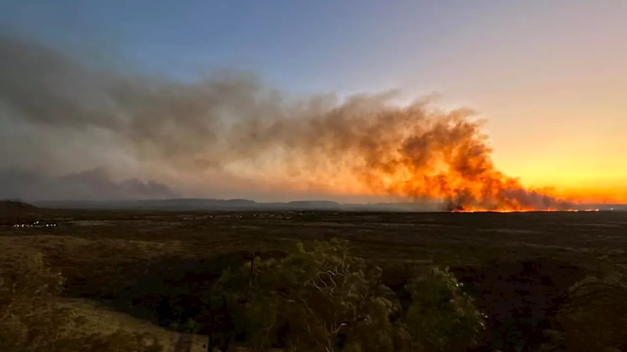 Water bomber brought in as firefighters battle four major blazes around Mount Isa