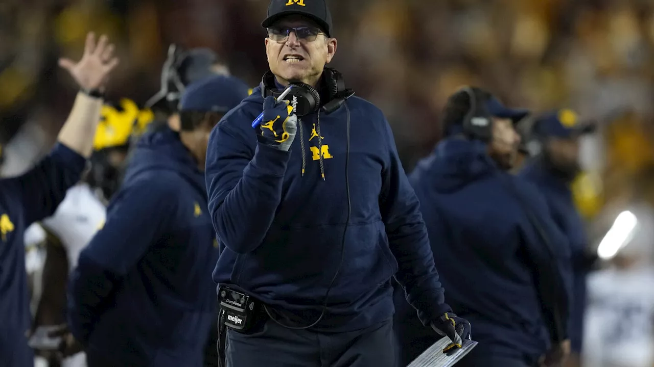 NCAA investigators interview Jim Harbaugh's staff about sign-stealing scheme, AP source says