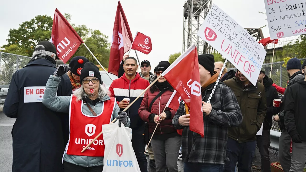 Strikers have shut down a vital Great Lakes shipping artery for days, and negotiations are looming