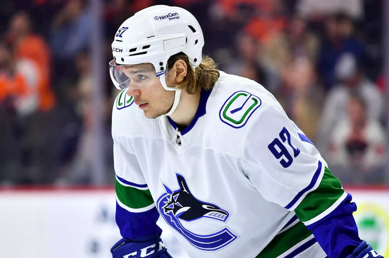 Vancouver Canucks prospect Vasily Podkolzin leaves AHL game on stretcher after hit